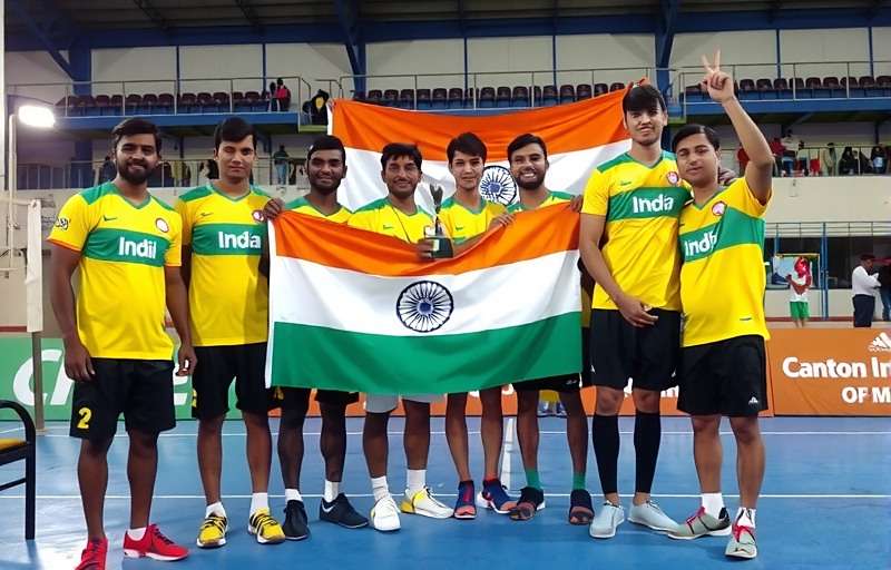Indian Volley Champs Tournament Celebration showing players with trophy and Indian flag